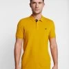 Pier One Polo - Mustard -Tienda De Hombres Con Estilo fa45949fb9734cf0964afc27ed0937b3